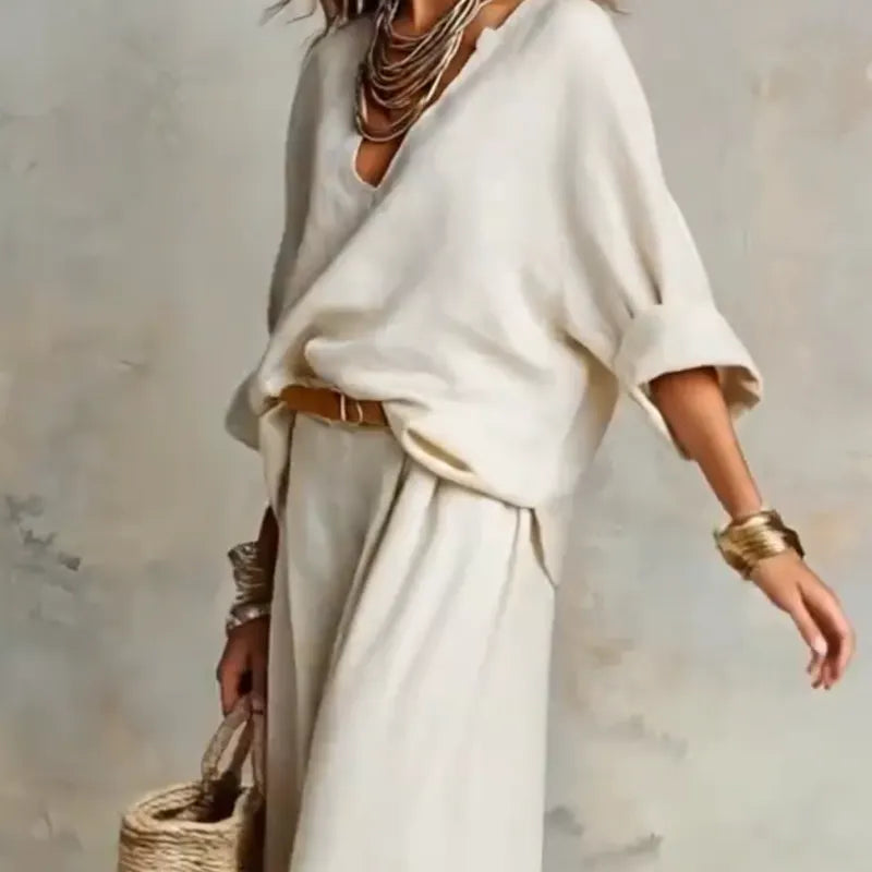 Woman wearing V-neck two piece set with wide leg pants