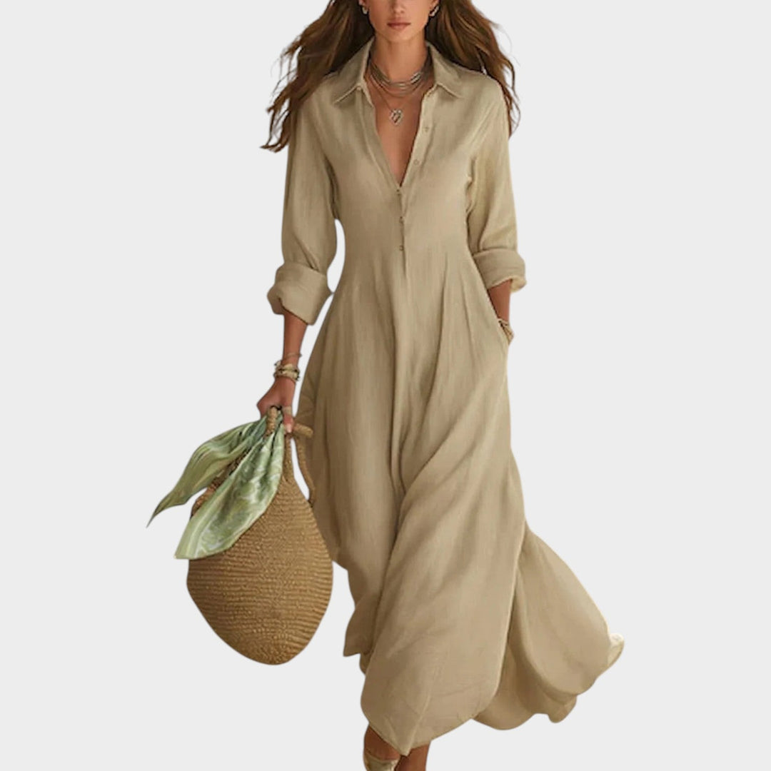 Woman wearing green button front maxi dress with long sleeves