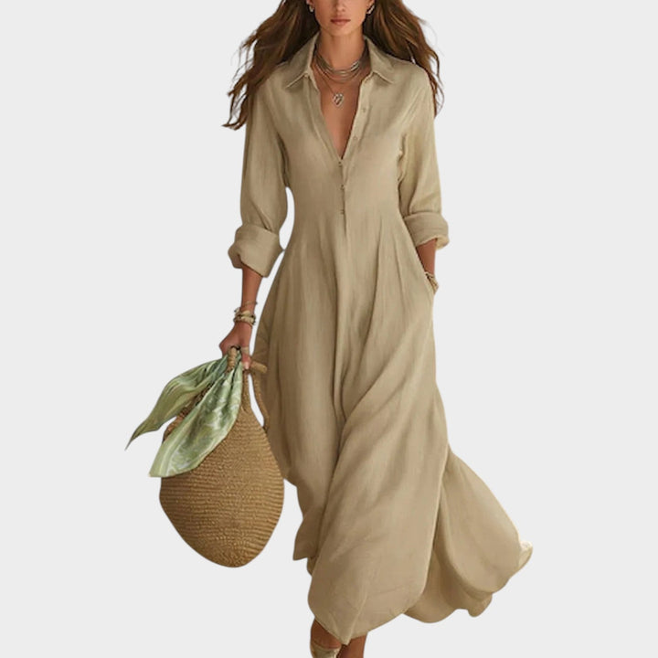 Woman wearing green button front maxi dress with long sleeves