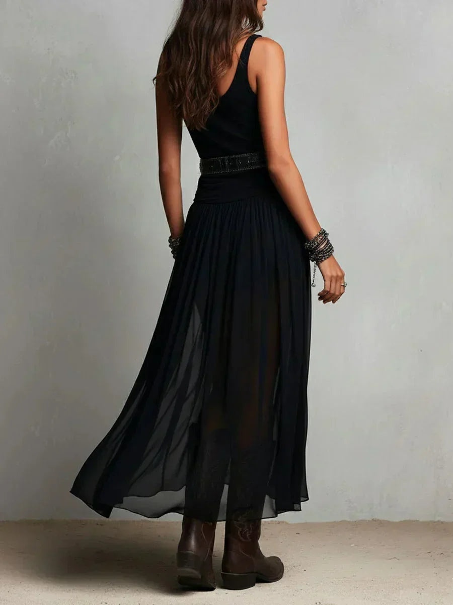 Woman wearing double layer maxi dress with sheer panels