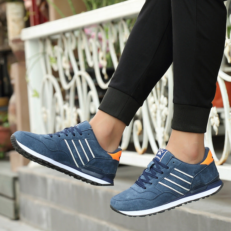 Men's gray low-top casual sneakers with rubber sole