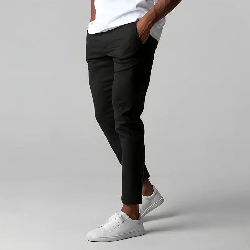 Man wearing slim straight business dress pants