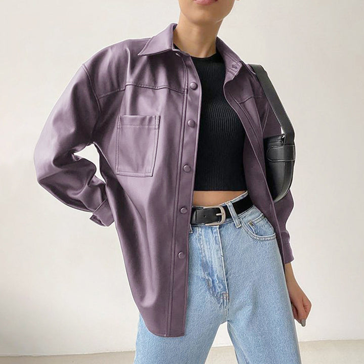 Women's black motorcycle jacket with loose biker-inspired fit