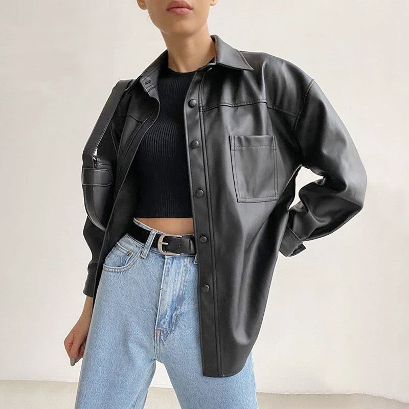 Women's black motorcycle jacket with loose biker-inspired fit