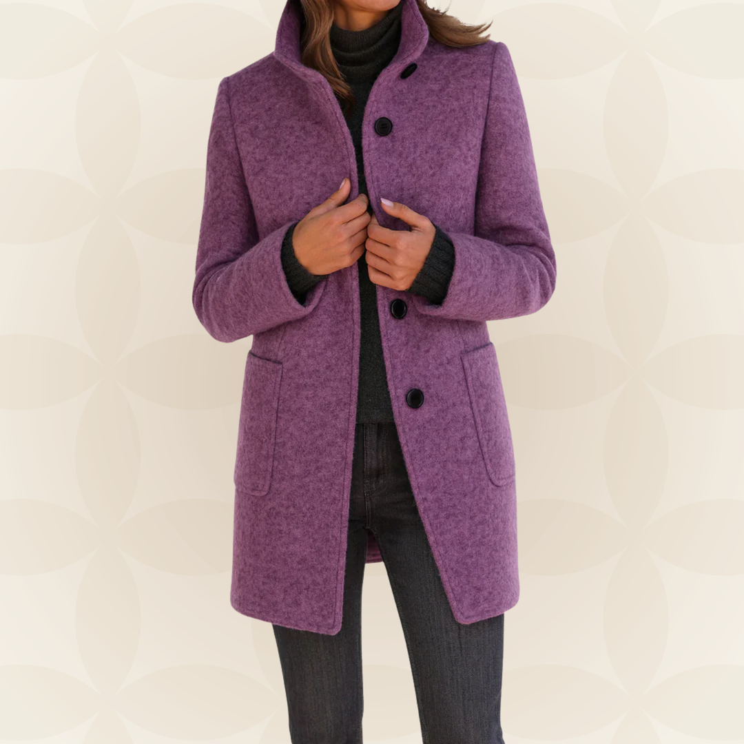 Woman wearing a classic coat with high collar