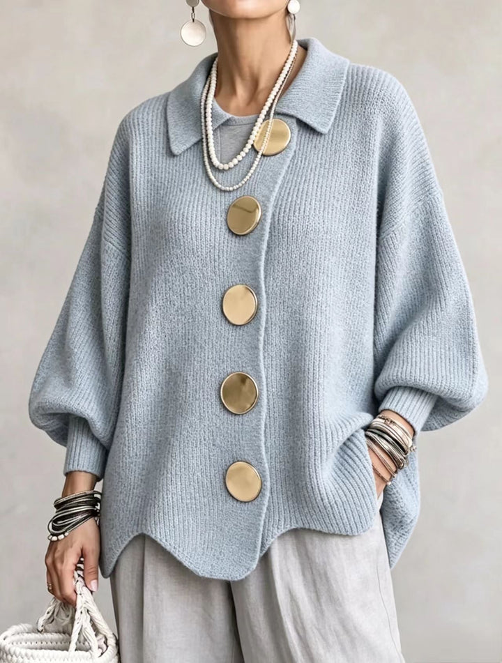Woman wearing oversized cardigan with lantern sleeves