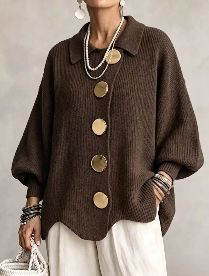 Woman wearing oversized cardigan with lantern sleeves