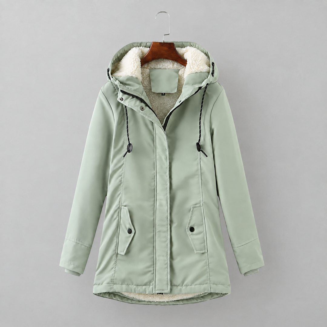 Woman wearing long quilted winter coat with hood
