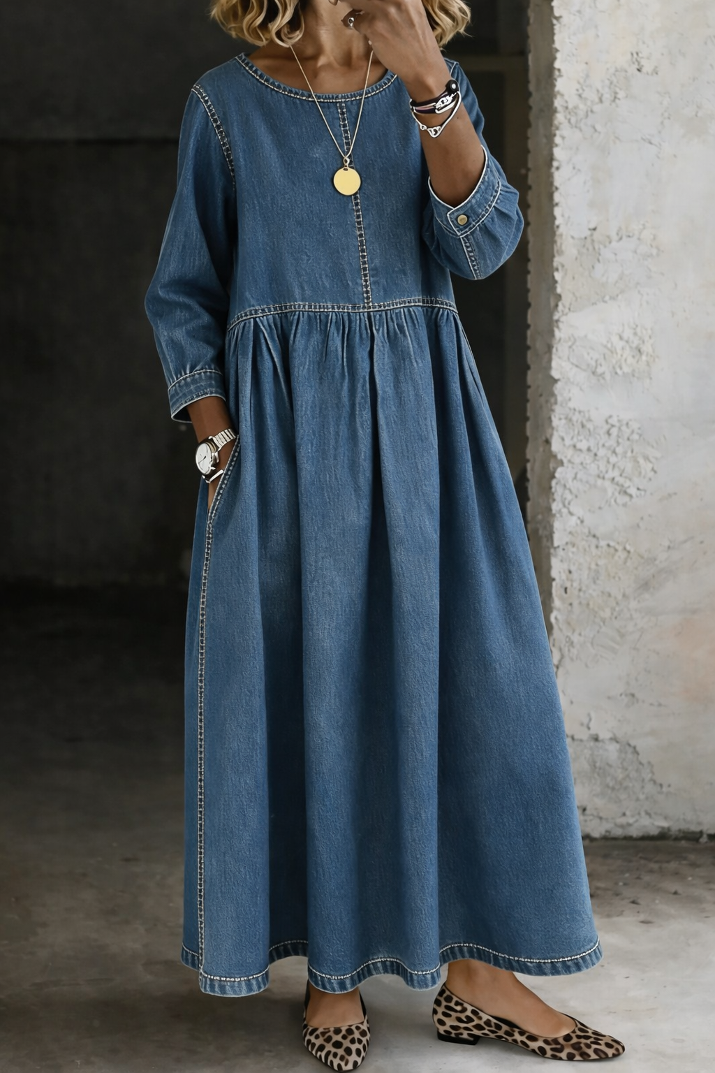 Woman wearing relaxed denim maxi dress with long sleeves