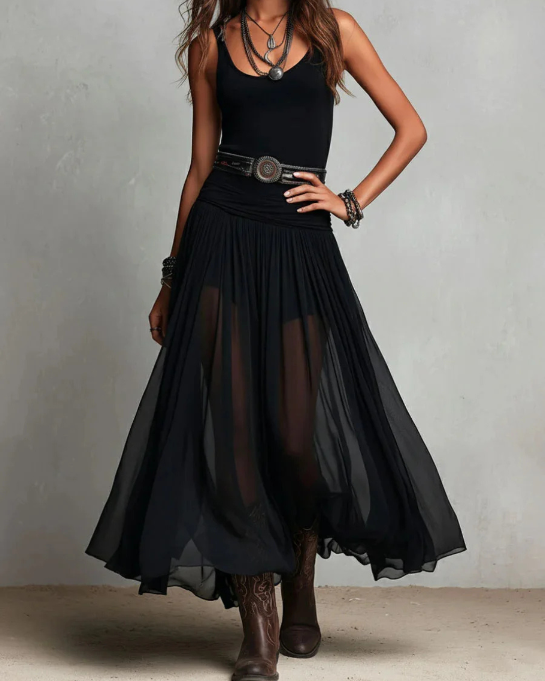 Woman wearing double layer maxi dress with sheer panels