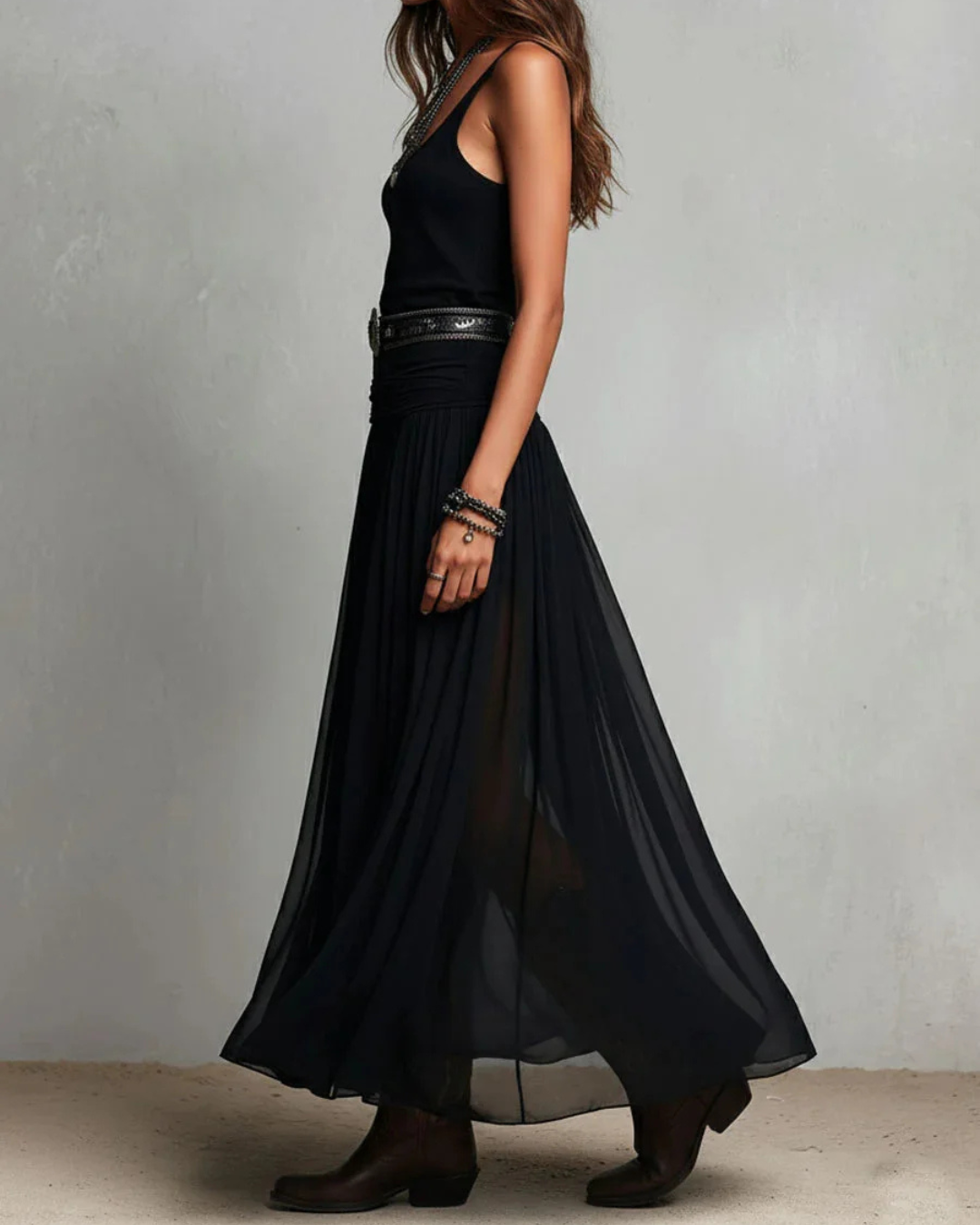 Woman wearing double layer maxi dress with sheer panels