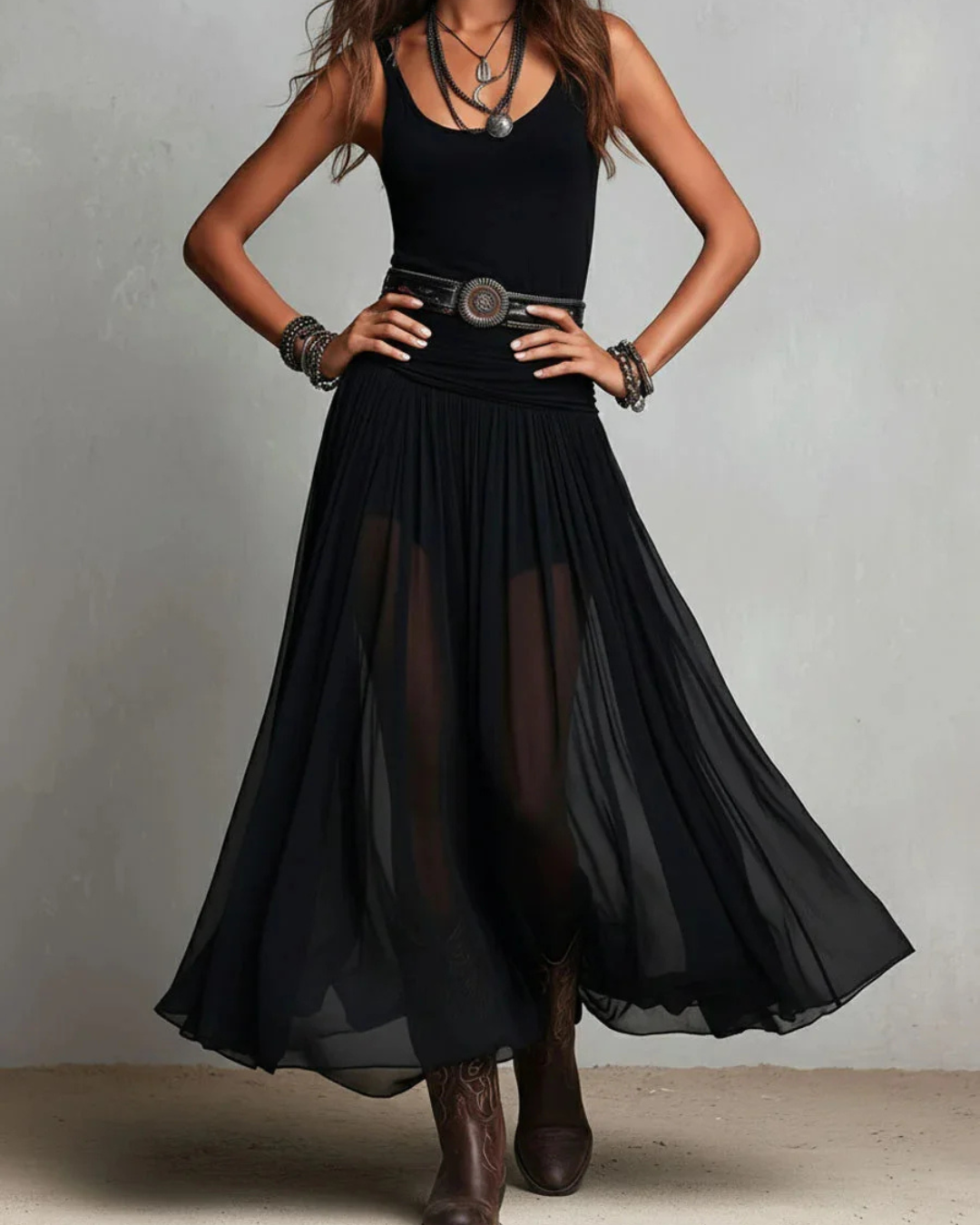 Woman wearing double layer maxi dress with sheer panels
