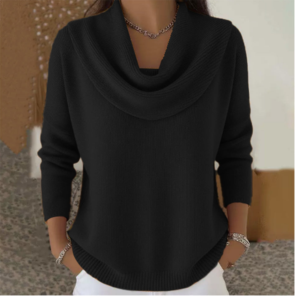 Woman wearing cowl neck knit sweater with ribbed cuffs
