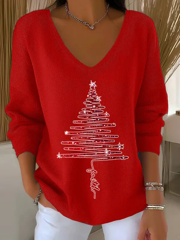 Woman wearing festive V-neck Christmas sweater indoors