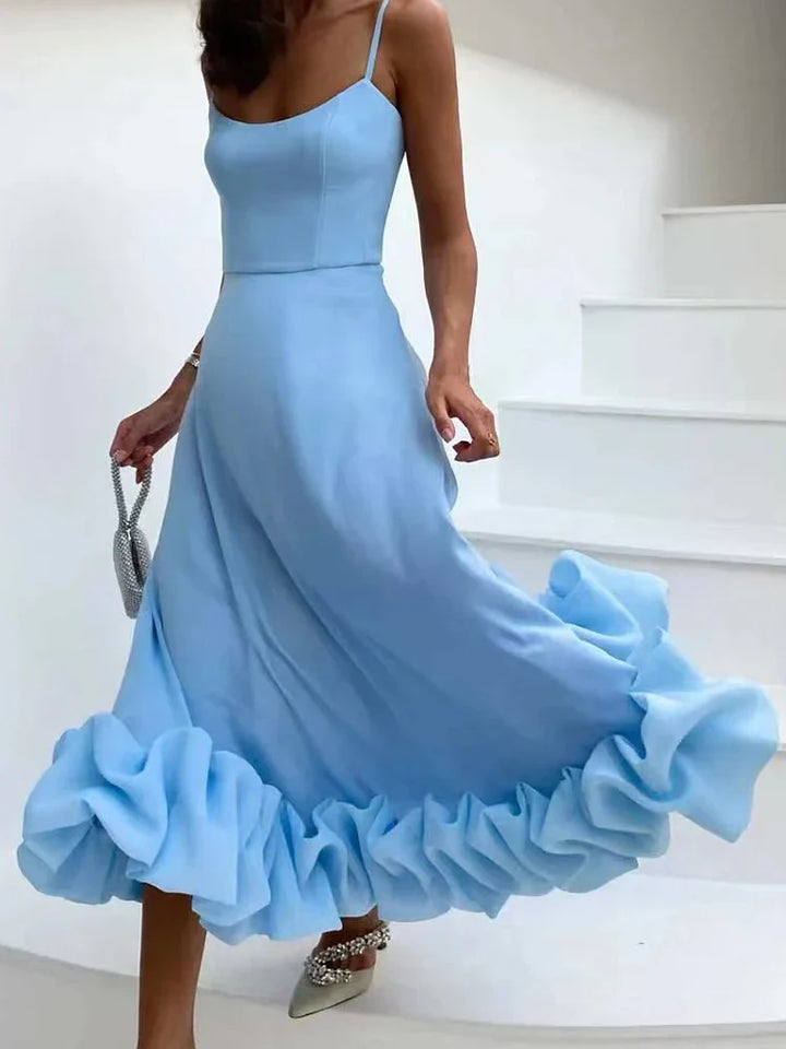 Prim | Flowy midi dress with ruffles