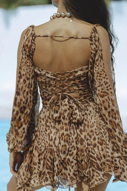 Woman wearing a flattering mini dress in black