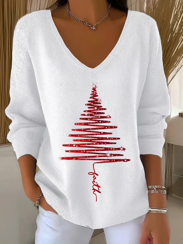 Woman wearing festive V-neck Christmas sweater indoors