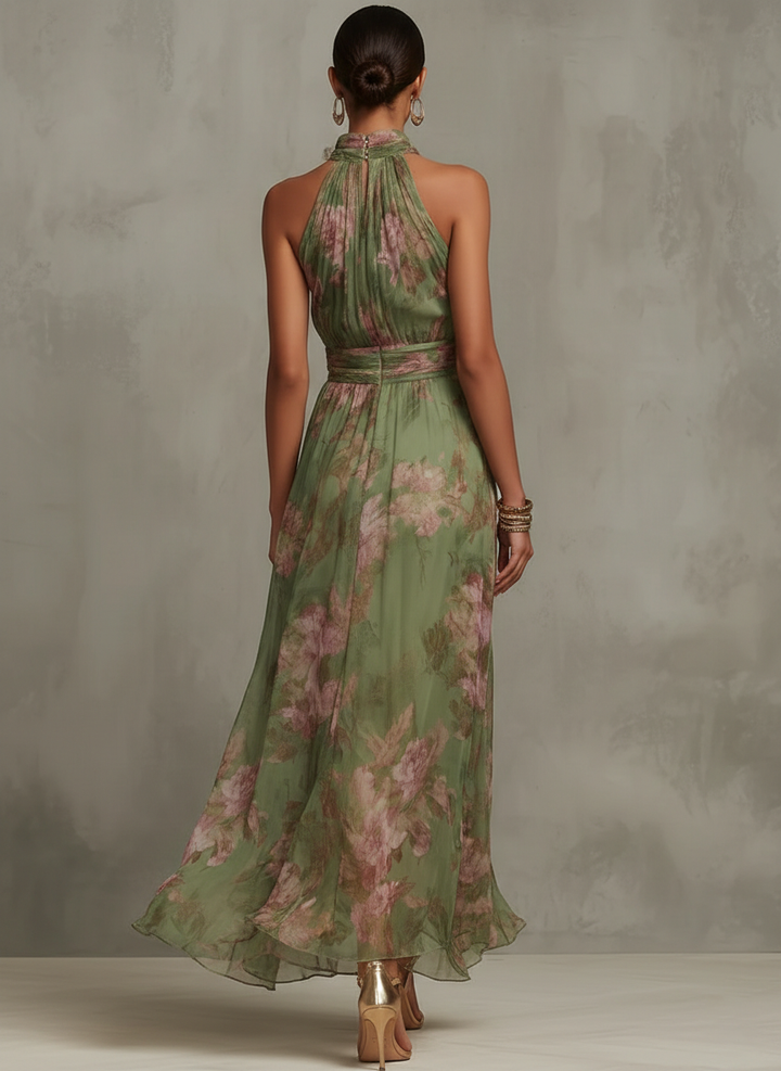 Woman wearing floral halter maxi dress with cinched waist