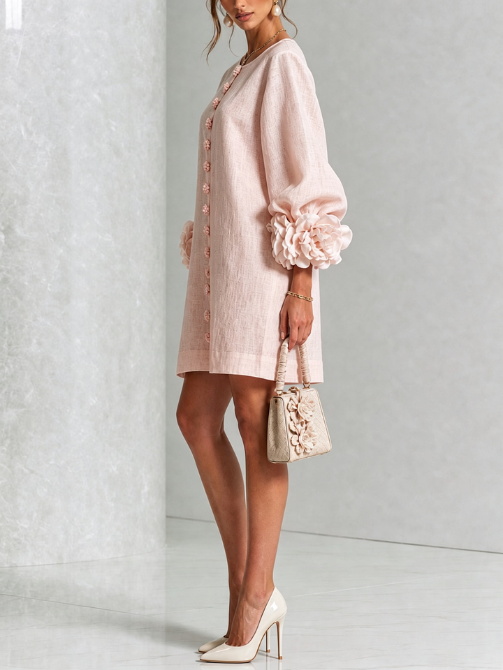 Pink floral mini dress with rosette cuffs