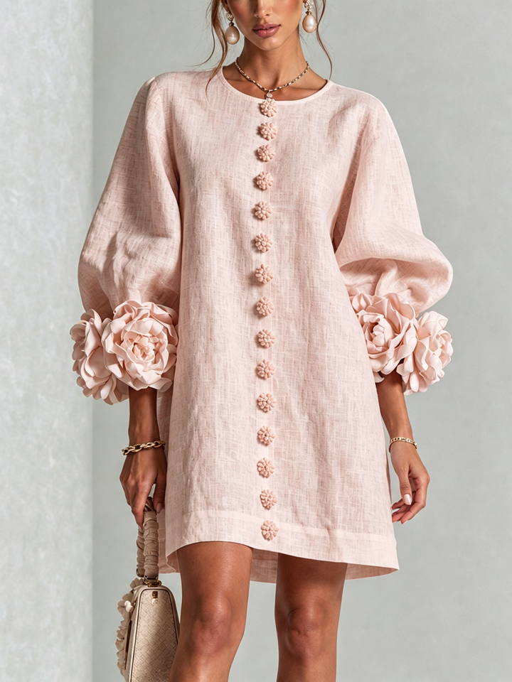 Pink floral mini dress with rosette cuffs