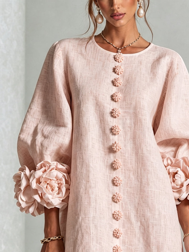 Pink floral mini dress with rosette cuffs
