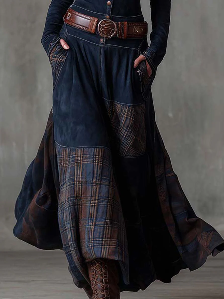 Woman wearing patchwork maxi dress with plaid panels and belt