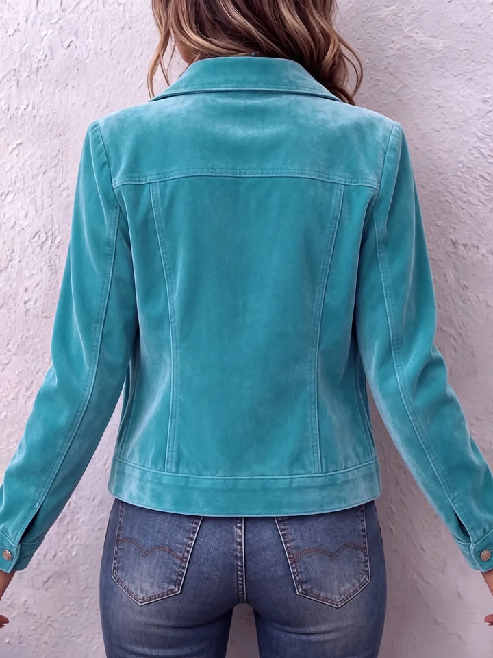 Woman in vintage wash button front jacket with chest pockets