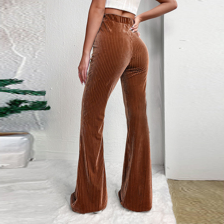 Woman wearing brown high waist corduroy wide leg pants