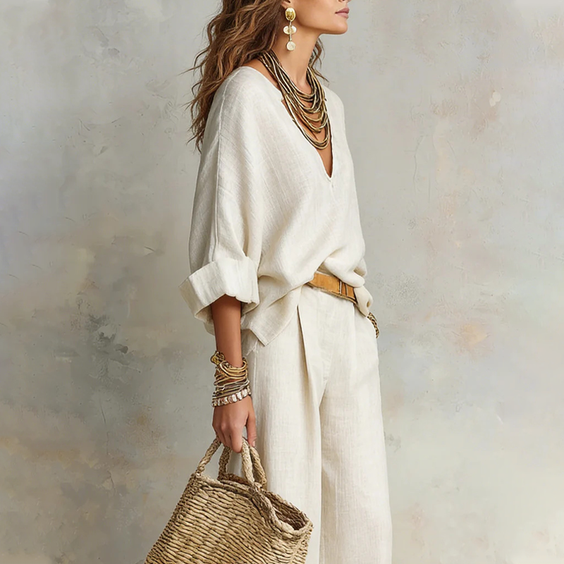 Woman wearing V-neck two piece set with wide leg pants