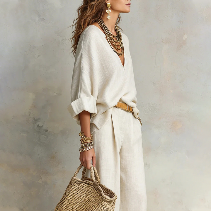 Woman wearing V-neck two piece set with wide leg pants