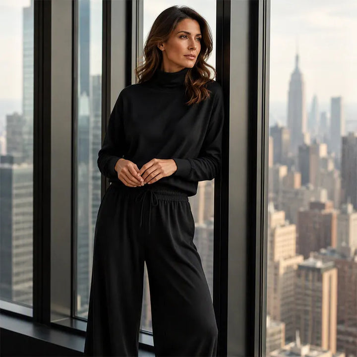 Woman wearing turtleneck two-piece set with wide-leg pants