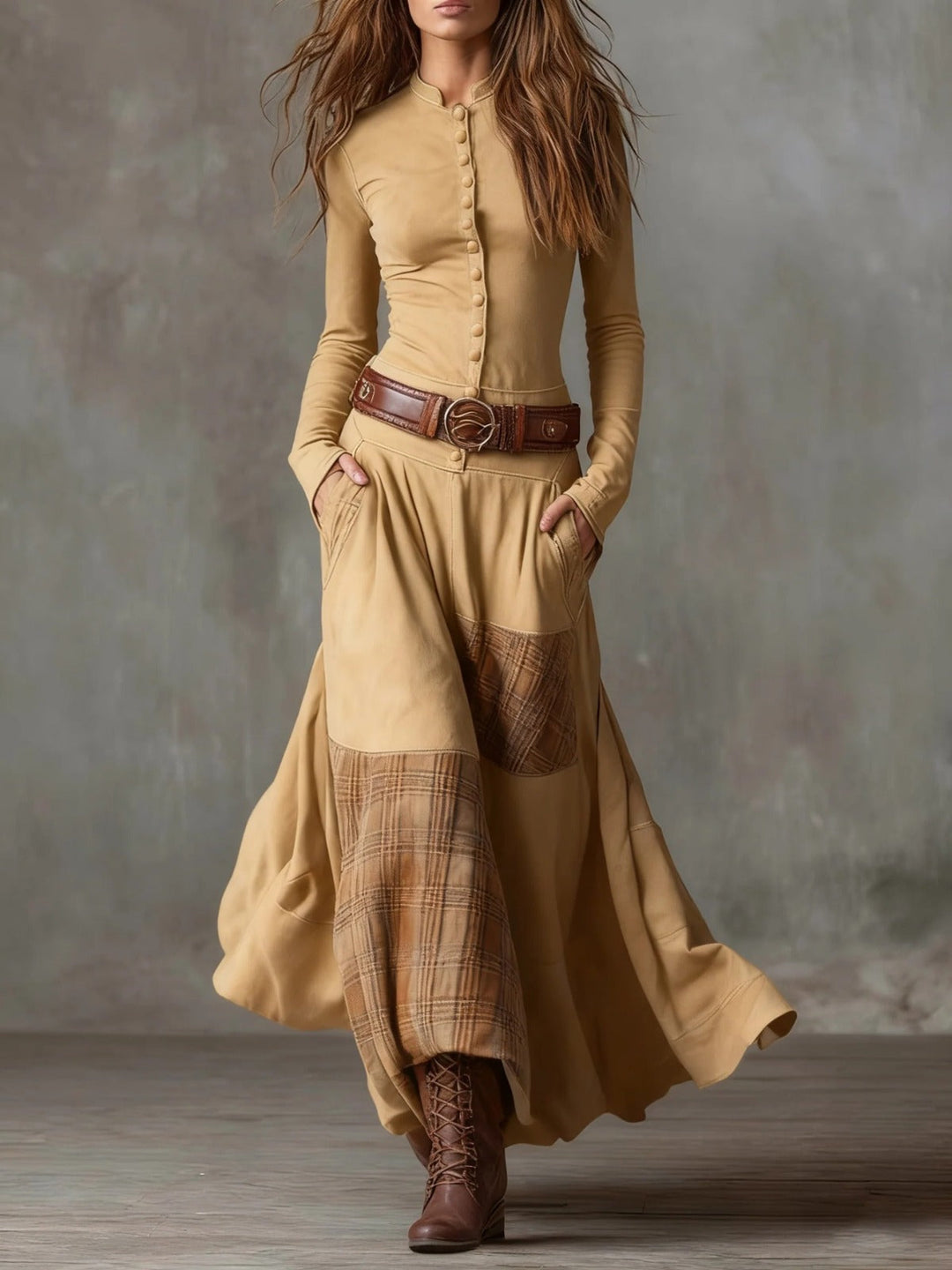 Woman wearing patchwork maxi dress with plaid panels and belt