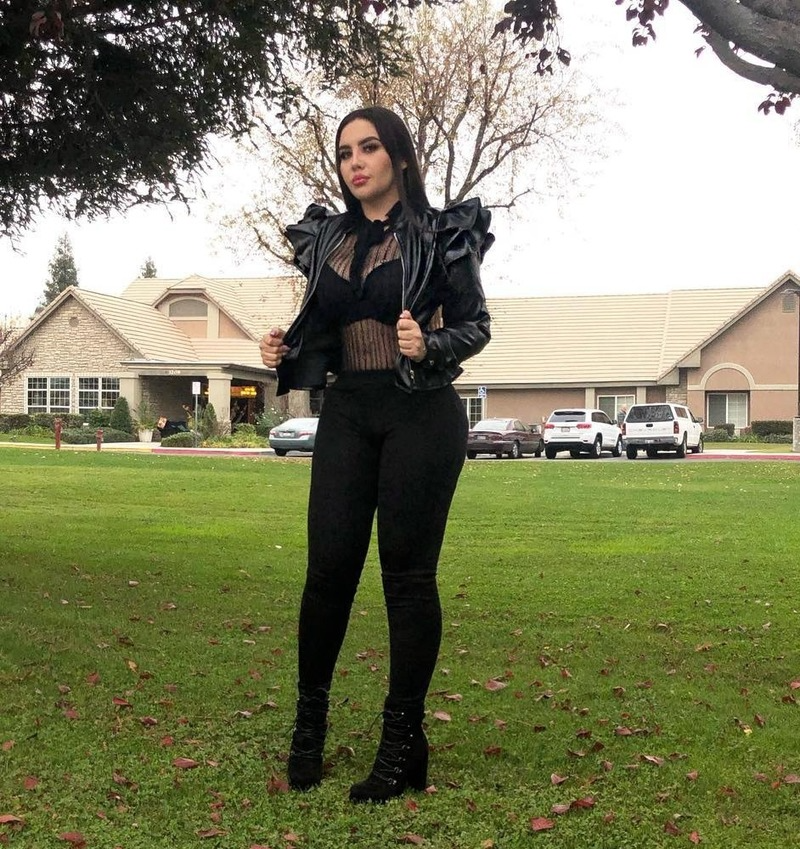 Black leather jacket with ruffle edge for women