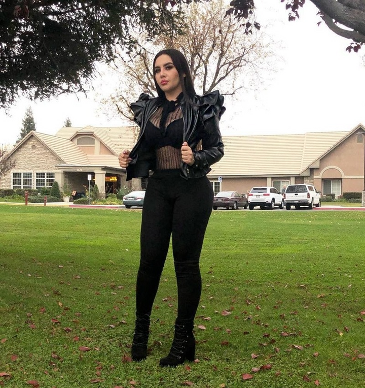 Black leather jacket with ruffle edge for women