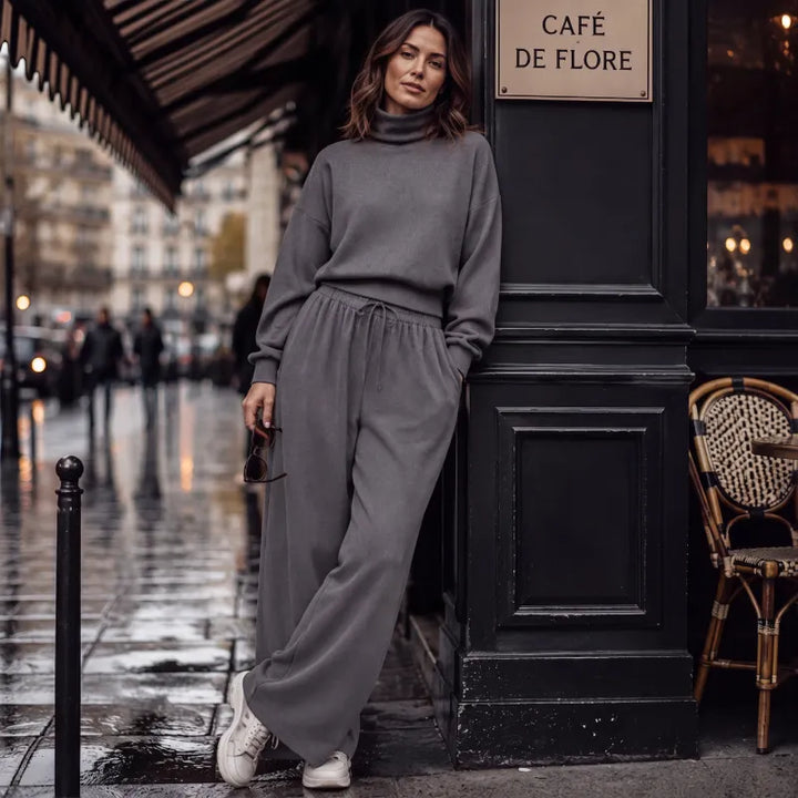 Woman wearing turtleneck two-piece set with wide-leg pants
