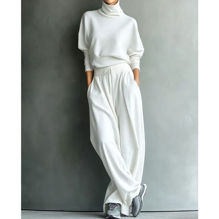 Woman wearing turtleneck two-piece set with wide-leg pants