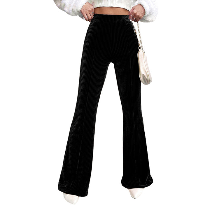 Woman wearing brown high waist corduroy wide leg pants