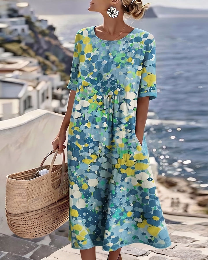 Woman wearing abstract floral print midi dress outdoors
