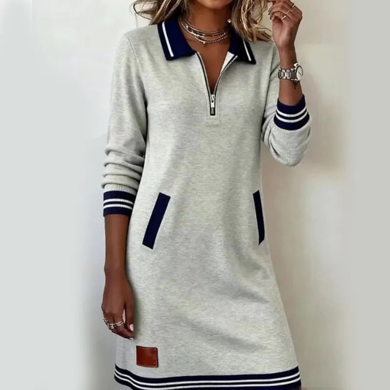 Woman wearing polo mini dress with quarter-zip collar