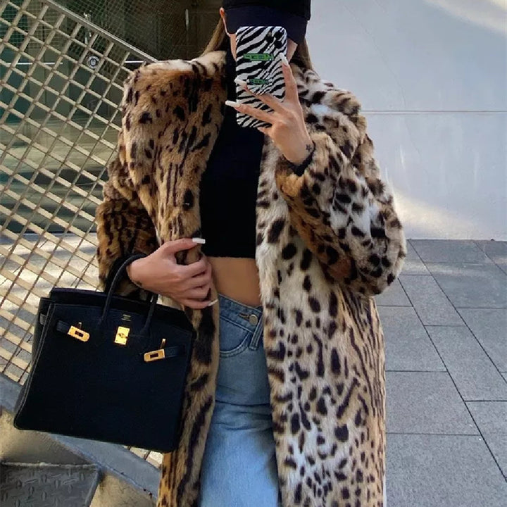 Woman wearing long leopard print faux fur coat