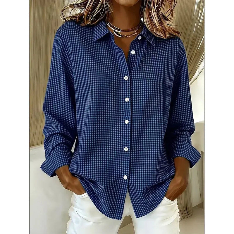 Woman wearing gingham button-up blouse with long sleeves