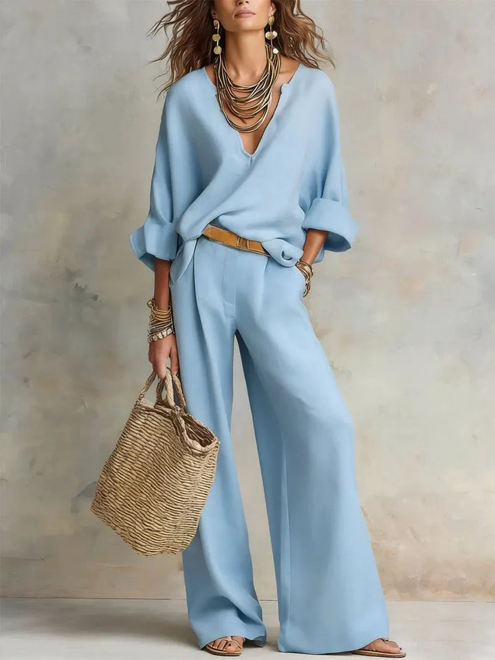 Woman wearing V-neck two piece set with wide leg pants