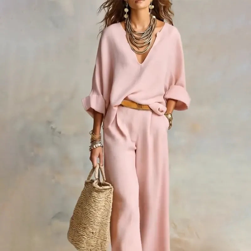 Woman wearing V-neck two piece set with wide leg pants