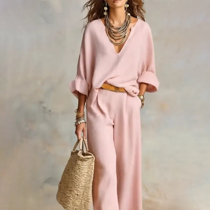 Woman wearing V-neck two piece set with wide leg pants
