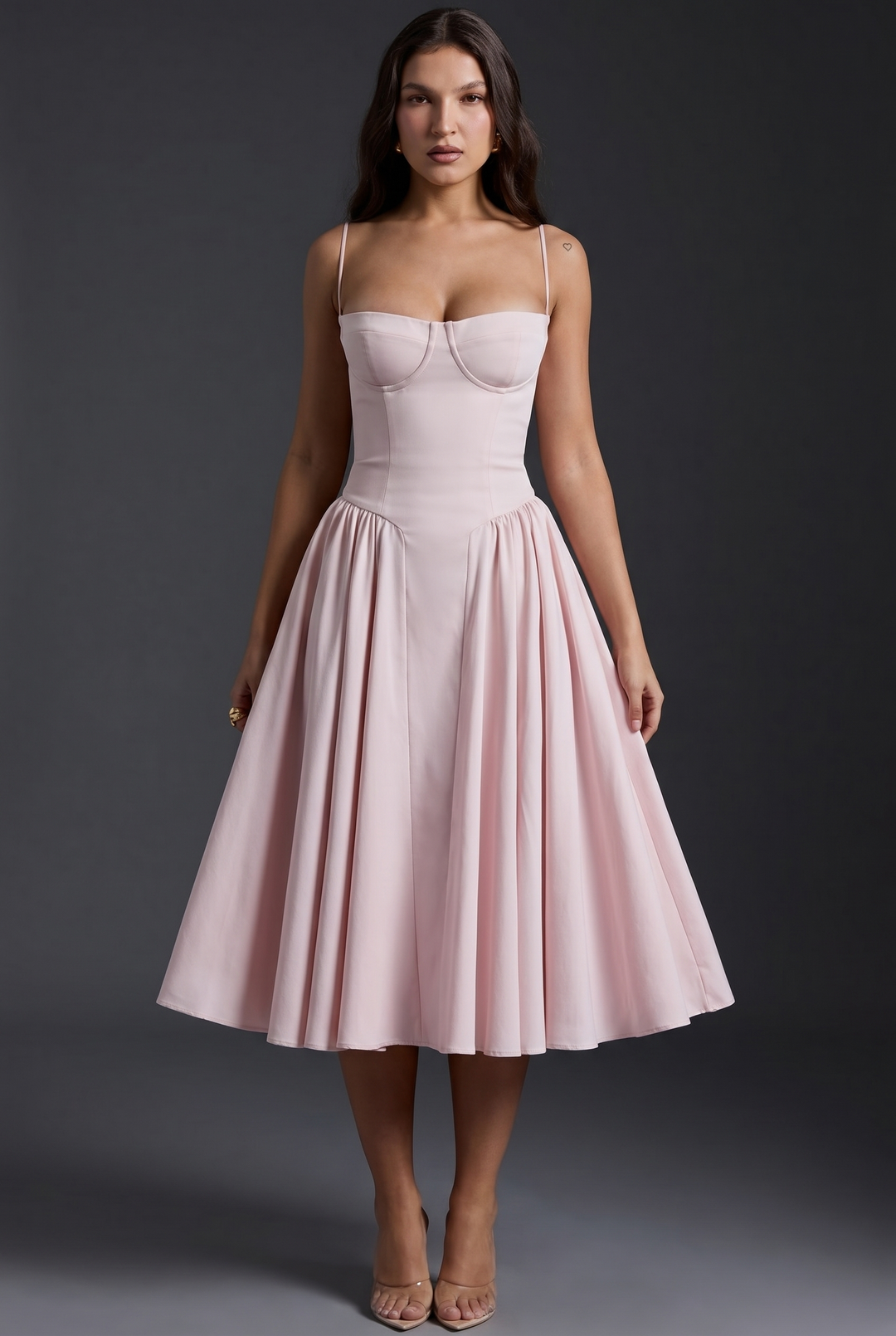 Woman wearing midi dress with adjustable straps