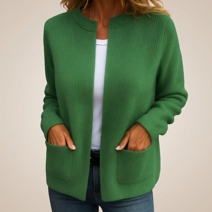 Woman wearing ribbed knit open front cardigan with pockets