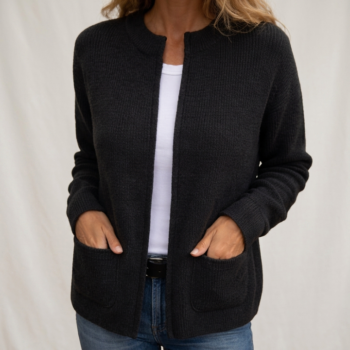 Woman wearing ribbed knit open front cardigan with pockets