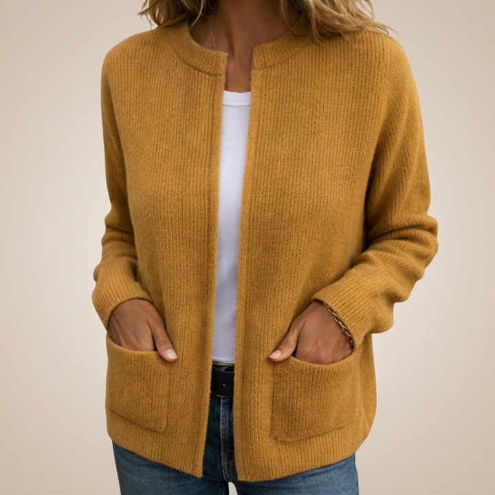 Woman wearing ribbed knit open front cardigan with pockets