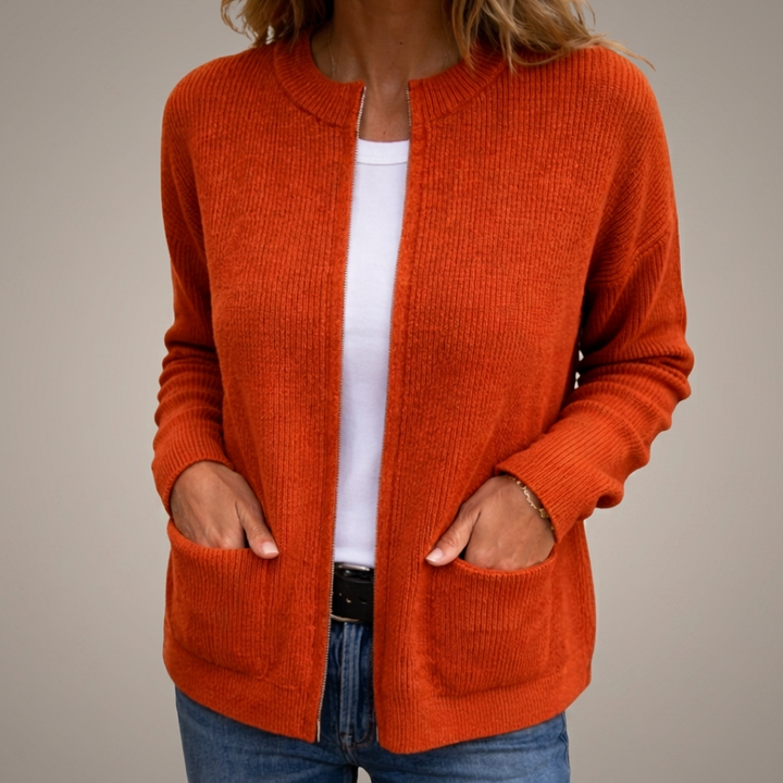 Woman wearing ribbed knit open front cardigan with pockets