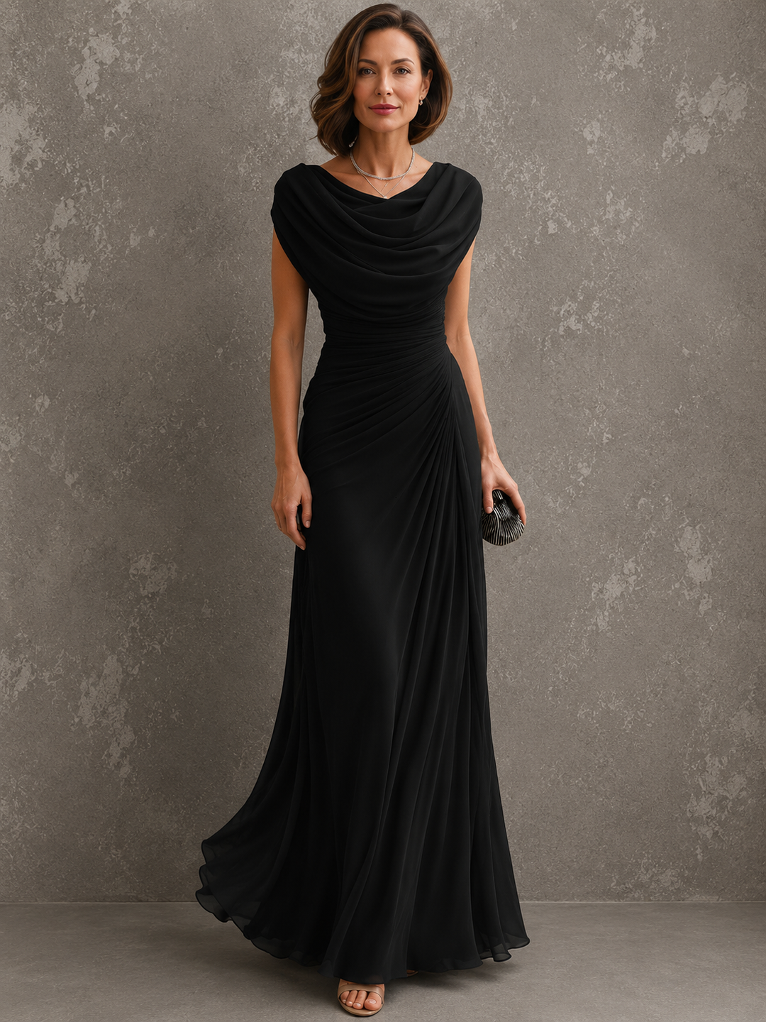 Woman wearing sleeveless draped maxi dress in full length